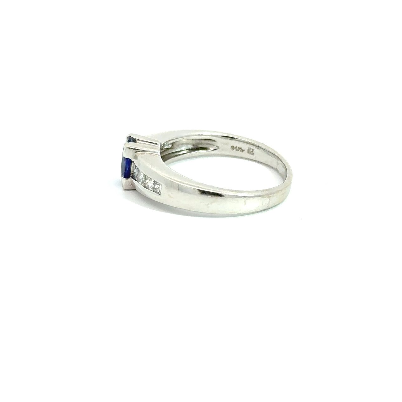 14k White Gold Natural Oval Cut Tanzanite and Princess Cut Diamond Ring