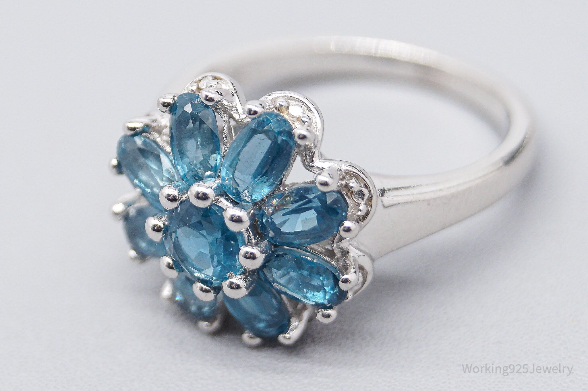 JTV TGGC Blue Topaz Flower Rhodium Over Sterling Silver Ring - Size 7.75