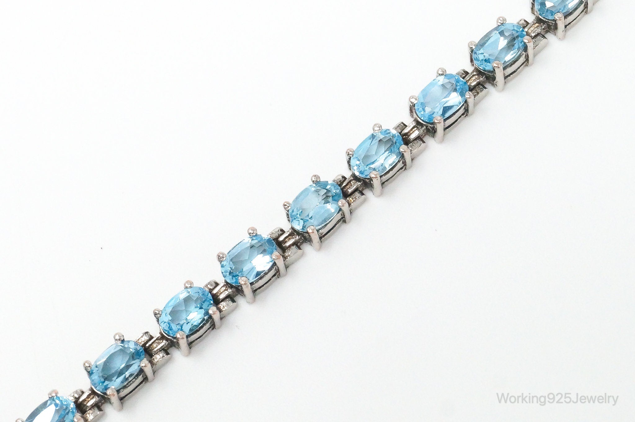 Vintage Designer ALX Blue Topaz Sterling Silver Tennis Bracelet