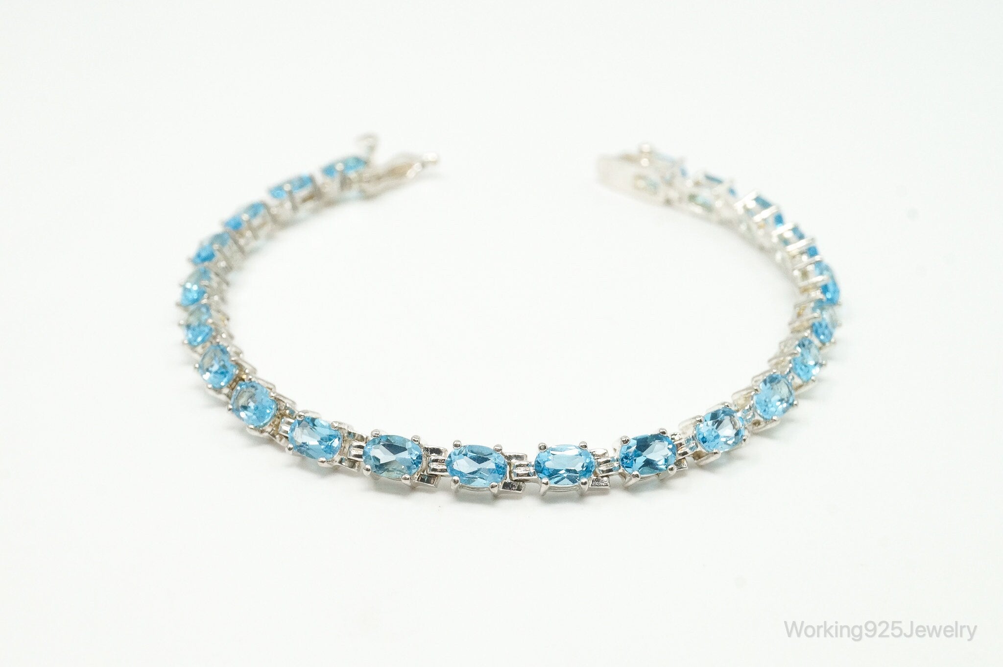 Vintage Designer ALX Blue Topaz Sterling Silver Tennis Bracelet