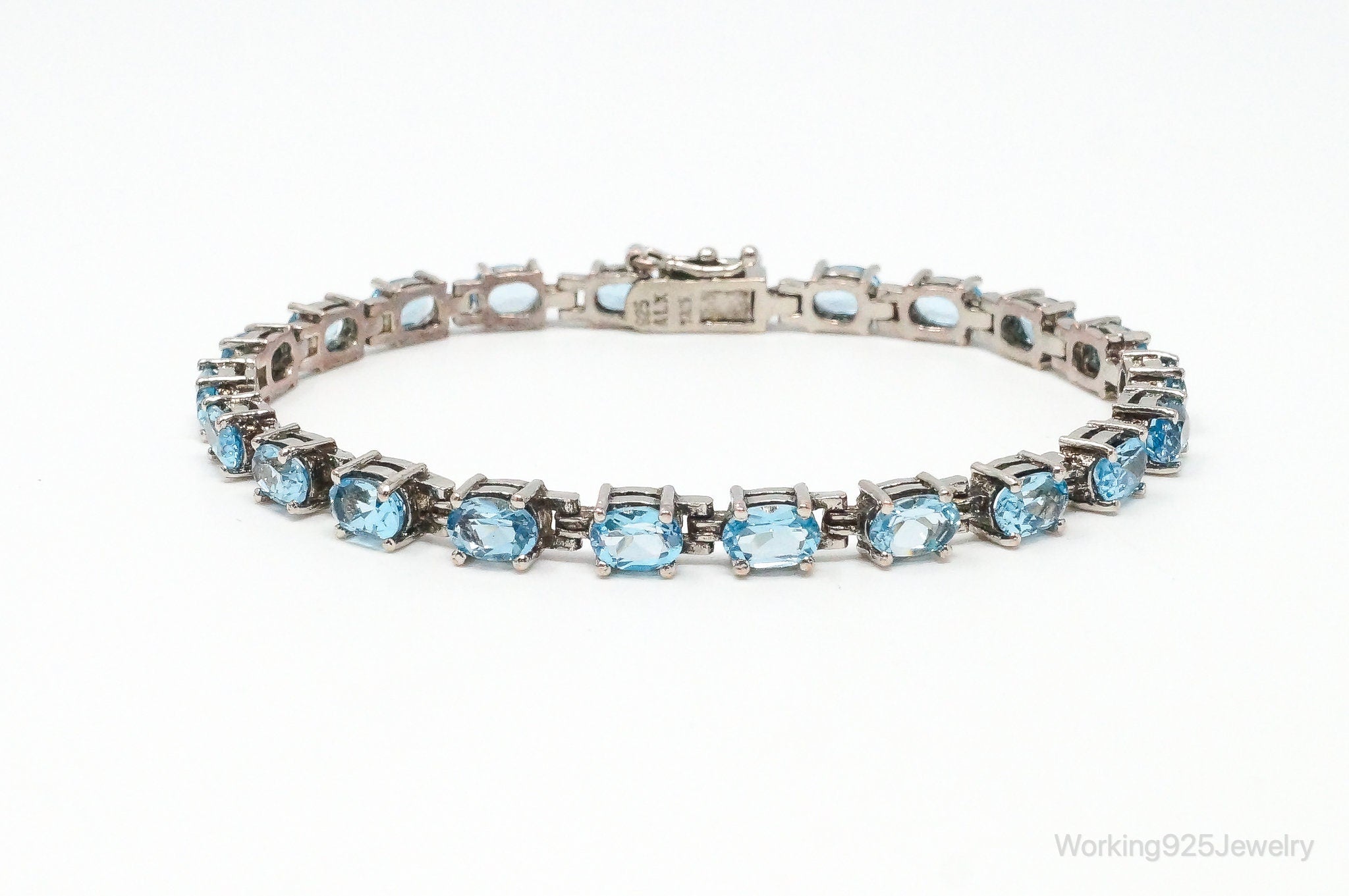 Vintage Designer ALX Blue Topaz Sterling Silver Tennis Bracelet